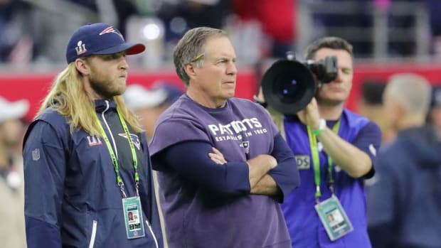 Steve and Bill Belichick share the sideline on game day.